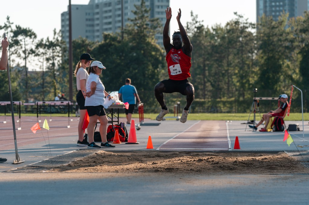 Spitfire's long jumper Matt Indome mid-leap at the CTFL Championships in Ottawa on Aug. 5, 2023. Photo Taken by Matt Racette.