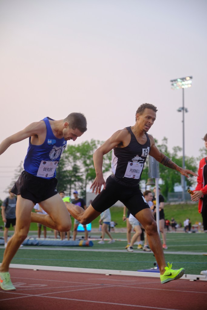 Berube and Huskies MVP Alec Purnell crossing the finish line at the Royal City Inferno Track & Field Festival in Guelph, Ont. Photo Taken on June 21, 2023 by Davis Rutledge. 